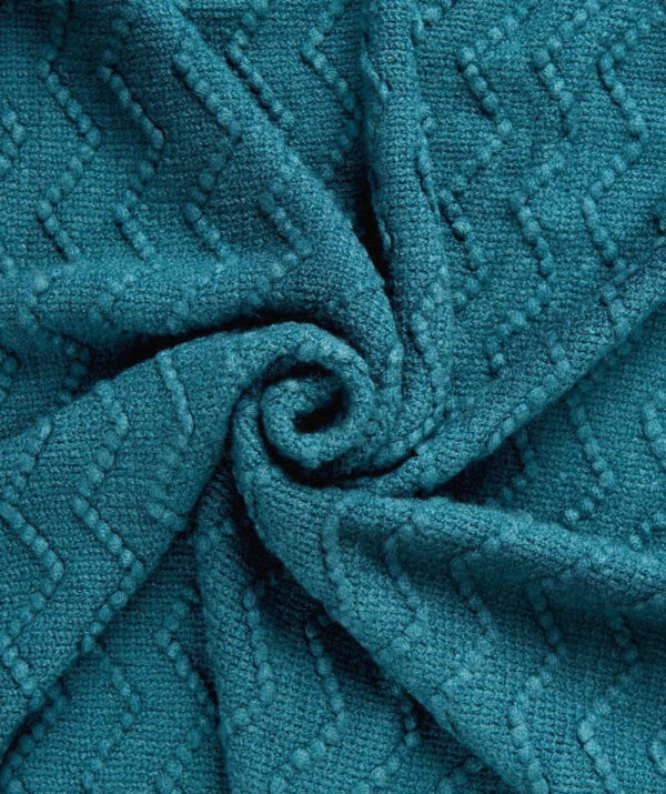Gestrickte Sofa-Decke mit Quasten – Bild 10